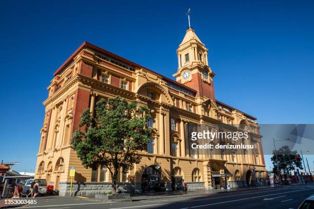 famous ferry building in auckland, new zealand - ferry terminal stock pictures, royalty-free photos & images