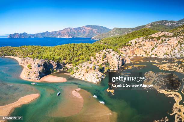 iztuzu beach tourist resort in mediterranean turkey - aegean turkey stock pictures, royalty-free photos & images