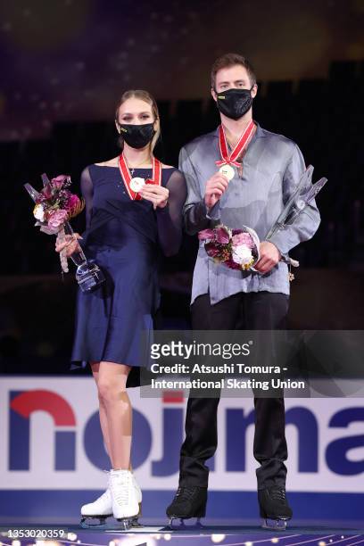 Gold medalists Victoria Sinitsina and Nikita Katsalapov of Russia pose on the podium at the medal ceremony for the Ice Dance during the ISU Grand...