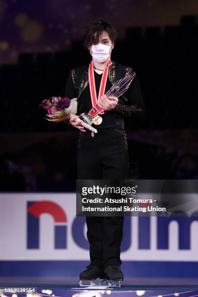 Gold medalist Shoma Uno of Japan poses on the podium at the medal ceremony for the Men's event during the ISU Grand Prix of Figure Skating - NHK...
