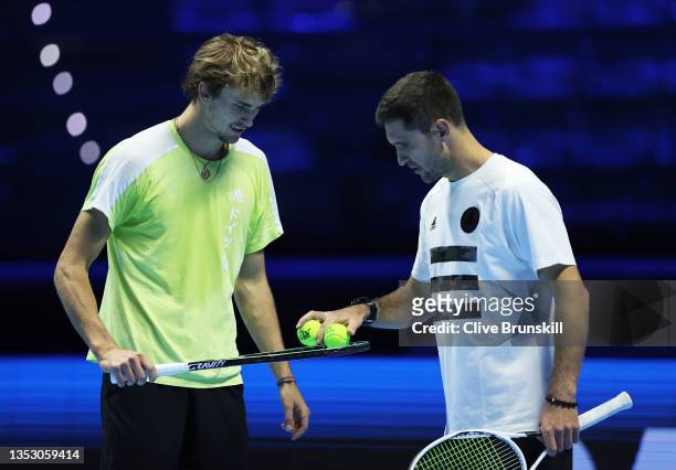 Alexander Zverev of Germany with his coach and brother Mischa Zverev during a practice session ahead of the Nitto ATP Tour Finals at Pala Alpitour on...