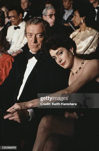 American actress Sean Young as Stacy Mansdorf and British actor Michael Caine as former secret agent Harry Anders in the film 'Blue Ice', 1992.