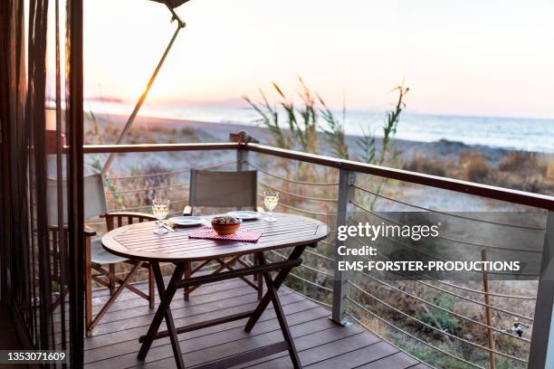 view from a wonderful glamping tent on the beach - luxury tent stock pictures, royalty-free photos & images