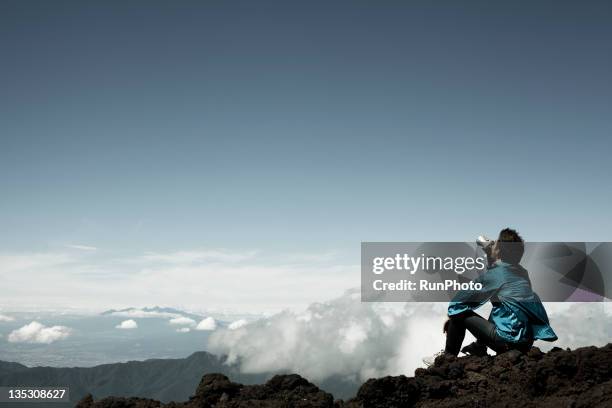 young man rinking water in the mountain - refresh stock pictures, royalty-free photos & images