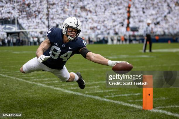 Theo Johnson of the Penn State Nittany Lions stretches the ball towards the pylon during the first half of the game against the Michigan Wolverines...
