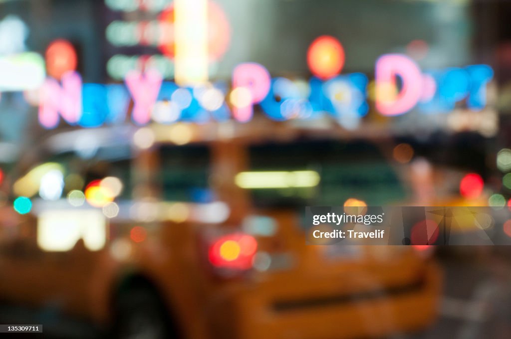 Defocused NYPD sign at Times Square