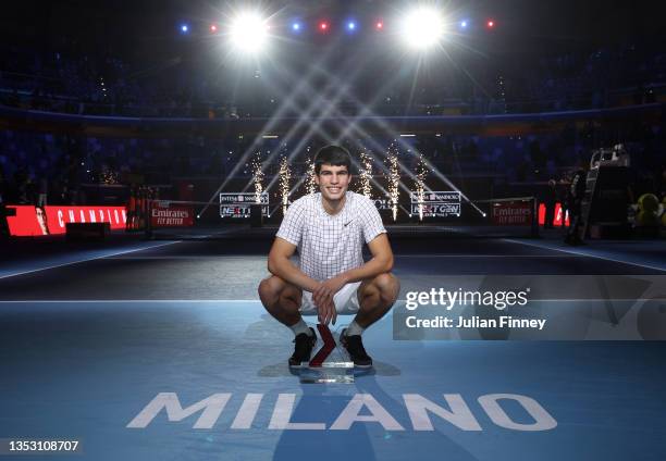 Carlos Alcaraz of Spain celebrates with the trophy after his win over Sebastian Korda of USA in the final match during Day Five of the Next Gen ATP...