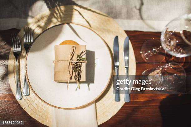 flat lay of beautiful tableware decorated for evening party. natural sun light - natural condition stock pictures, royalty-free photos & images