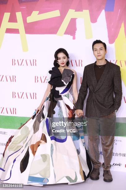 Actress Yang Mi and singer William Chan Wai-ting pose at red carpet of 2021 Bazaar Star Charity Night on November 13, 2021 in Shenzhen, Guangdong...