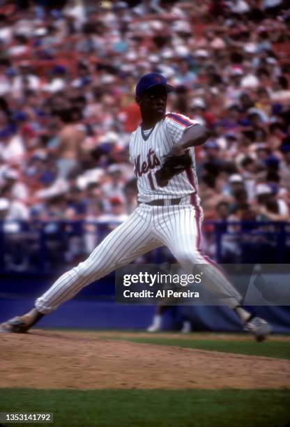 Pitcher Dwight Gooden of the New York Mets is shown pitching in the game between vs The New York Mets at Shea Stadium on in Flushing, New York.