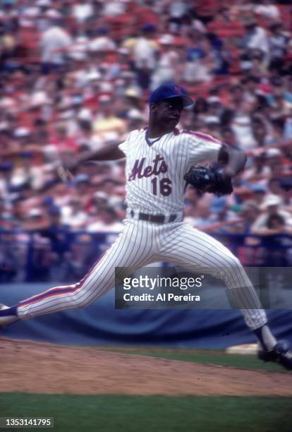 Pitcher Dwight Gooden of the New York Mets is shown pitching in the game between vs The New York Mets at Shea Stadium on in Flushing, New York.