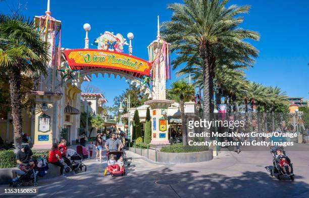 November 13: Visitors make their way around Disney California Adventure Park during the Festival of the Holidays in Anaheim on Saturday, November 13,...