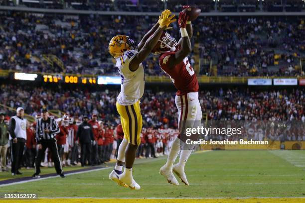 Montaric Brown of the Arkansas Razorbacks intercepts a pass intended for Devonta Lee of the LSU Tigers during overtime at Tiger Stadium on November...