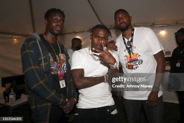 Darren Collison, DaBaby and Roger Mason attend 2021 Ballerfest: Music Lives at Bayfront Park on November 13, 2021 in Miami, Florida.