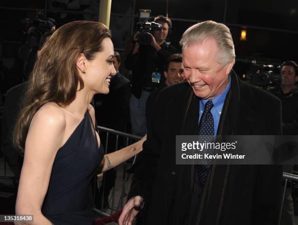 Writer/director Angelina Jolie and actorJon Voight arrive at the premiere of FilmDistrict's "In the Land of Blood and Honey" held at ArcLight Cinemas...