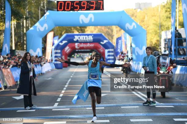 Runner arrives at the finish line of the 20th Madrid Half Marathon on November 14 in Madrid, Spain. Madrid hosts this Sunday its 20th Half Marathon,...