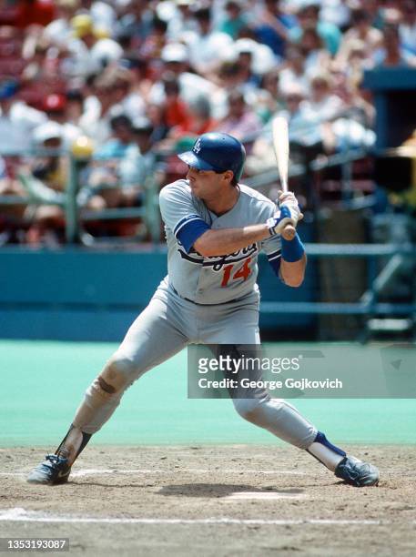 Mike Scioscia of the Los Angeles Dodgers bats against the Pittsburgh Pirates during a Major League Baseball game at Three Rivers Stadium in 1987 in...