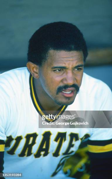 Catcher Tony Pena of the Pittsburgh Pirates looks on from the dugout before a Major League Baseball spring training exhibition game at McKechnie...