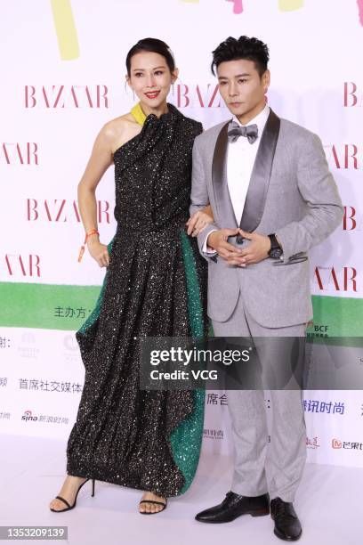 Actress Ada Choi Siu-fan and her husband Max Zhang Jin pose at red carpet of 2021 Bazaar Star Charity Night on November 13, 2021 in Shenzhen,...