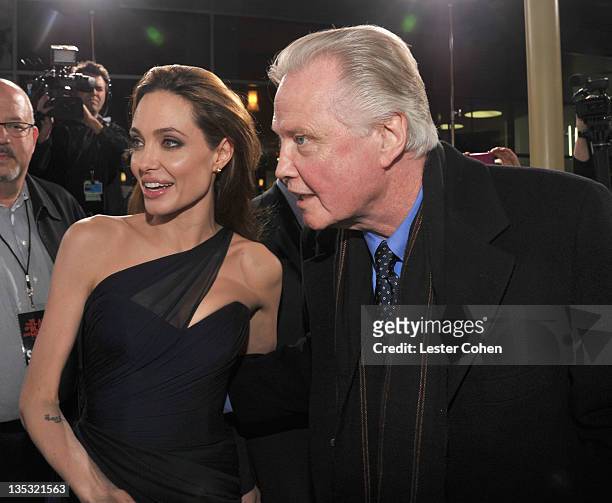 Writer/Director Angelina Jolie and actor Jon Voight arrives at the "In the Land of Blood and Honey" premiere held at ArcLight Cinemas on December 8,...