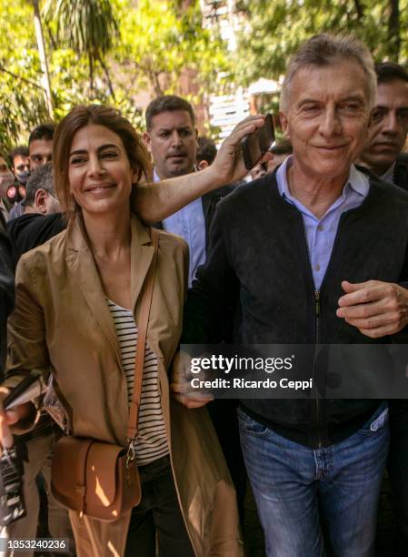 Former president of Argentina Mauricio Macri arrives with wife Juliana Awada to cast his vote during legislative midterm elections at Wenceslao Posse...