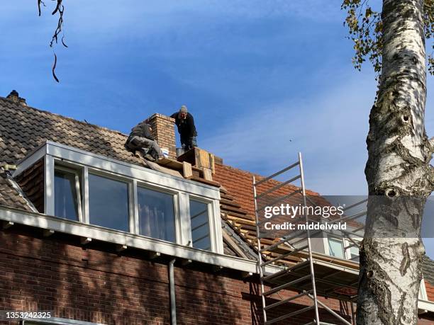 restoring a brick chimney - service level high stock pictures, royalty-free photos & images