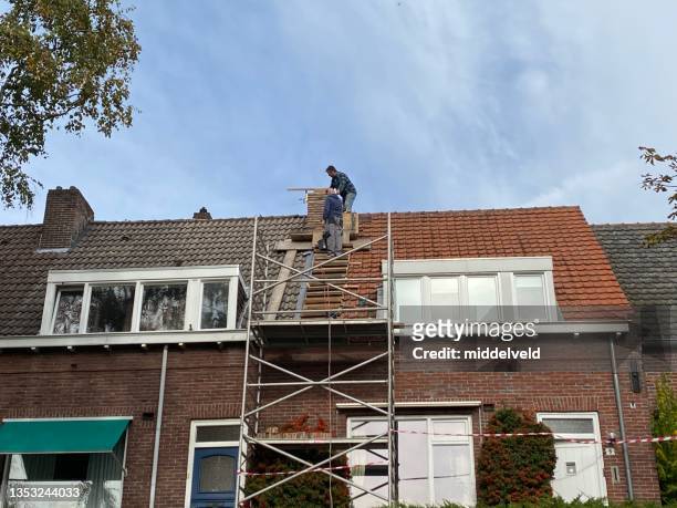restoring a brick chimney - service level high stock pictures, royalty-free photos & images