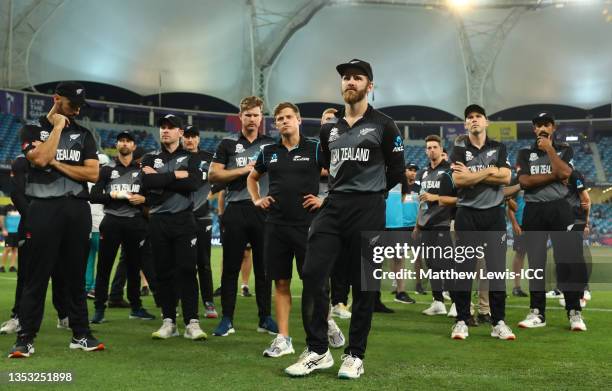 Players of New Zealand cut dejected figures following the ICC Men's T20 World Cup final match between New Zealand and Australia at Dubai...