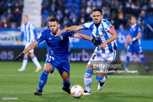 Recio of CD Leganes battles for the ball with Matheus Aias of Real Oviedo during the LaLiga Smartbank match between CD Leganes and Real Valladolid CF...