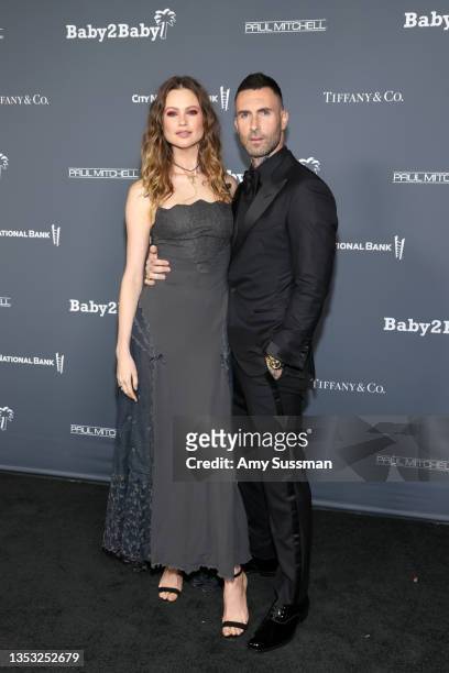 Behati Prinsloo and Adam Levine attend the Baby2Baby 10-Year Gala presented by Paul Mitchell on November 13, 2021 in West Hollywood, California.