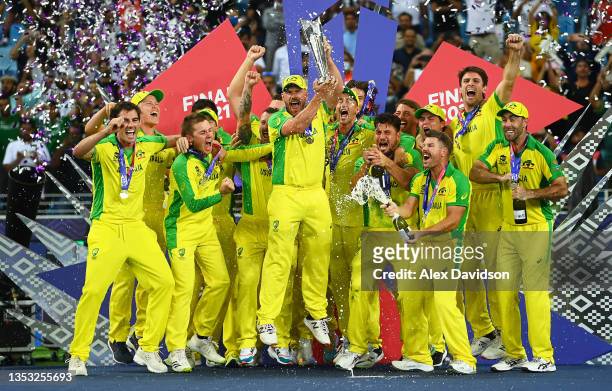 Aaron Finch of Australia lifts the ICC Men's T20 World Cup Trophy following the ICC Men's T20 World Cup final match between New Zealand and Australia...