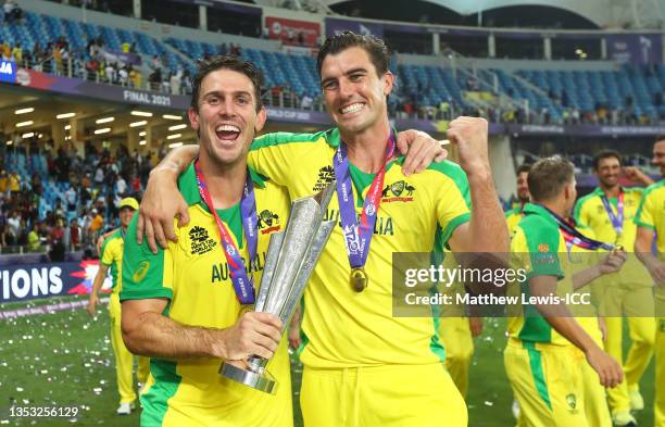 Mitchell Marsh and Pat Cummins of Australia celebrate following the ICC Men's T20 World Cup final match between New Zealand and Australia at Dubai...