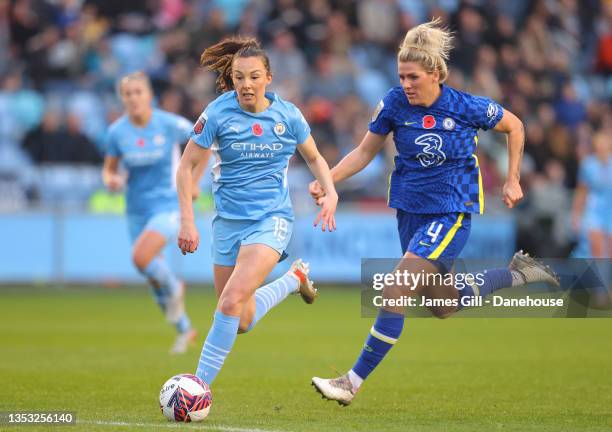 Caroline Weir of Manchester City Women and Millie Bright of Chelsea Women battle for the ball during the Barclays FA Women's Super League match...