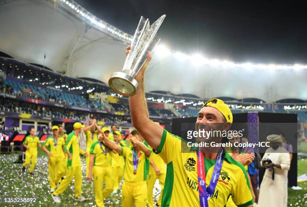 Glenn Maxwell of Australia celebrates with the ICC Men's T20 World Cup Trophy following the ICC Men's T20 World Cup final match between New Zealand...