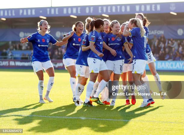 Simone Magill of Everton celebrates with teammates after scoring their team's first goal during the Barclays FA Women's Super League match between...