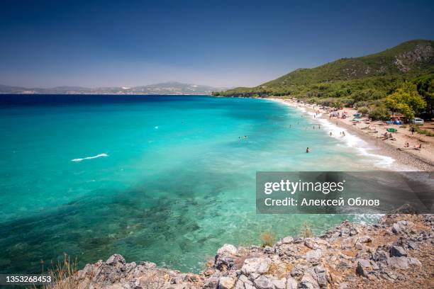 kusadasi, turkey - july, 2017 pebble beach in the dilek national park - península fotografías e imágenes de stock