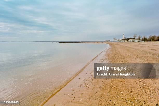 the lighthouse on the horizon - connecticut lighthouses stock pictures, royalty-free photos & images