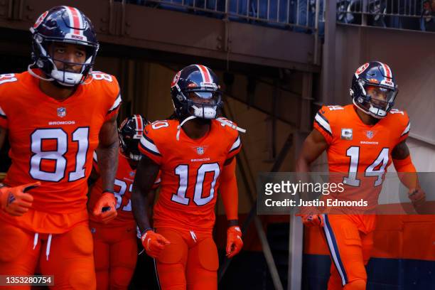 Tim Patrick of the Denver Broncos, Jerry Jeudy and Courtland Sutton take to the field before a game against the Philadelphia Eagles at Empower Field...