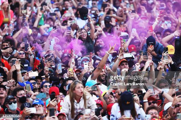 Fans enjoy the podium celebrations during the F1 Grand Prix of Brazil at Autodromo Jose Carlos Pace on November 14, 2021 in Sao Paulo, Brazil.