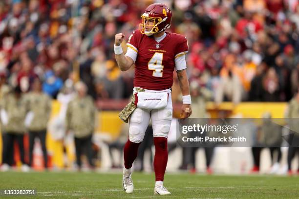 Taylor Heinicke of the Washington Football Team celebrates a first down during the fourth quarter against the Tampa Bay Buccaneers at FedExField on...
