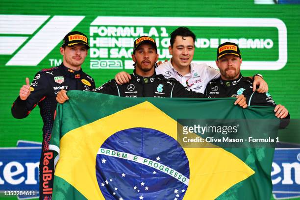 Race winner Lewis Hamilton of Great Britain and Mercedes GP, second placed Max Verstappen of Netherlands and Red Bull Racing and third placed...