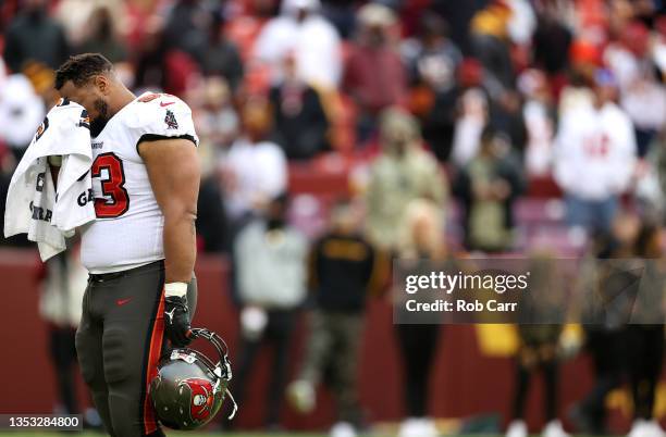 Ndamukong Suh of the Tampa Bay Buccaneers reacts during an injury timeout during the fourth quarter against the Washington Football Team at...