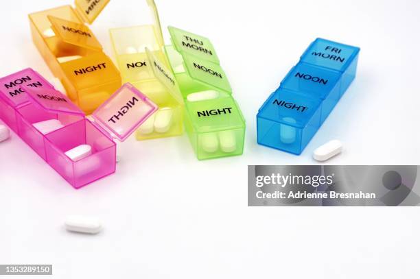 pill organizers - memories box stock pictures, royalty-free photos & images