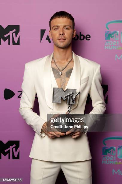 Best MTV Russia Act Award winner Max Barskih poses in the winners room during the MTV EMAs 2021 'Music for ALL' at the Papp Laszlo Budapest Sports...