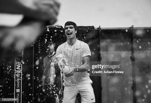 Carlos Alcaraz of Spain continues the celebrations into the locker room after his win over Sebastian Korda of USA in the final match during Day Five...