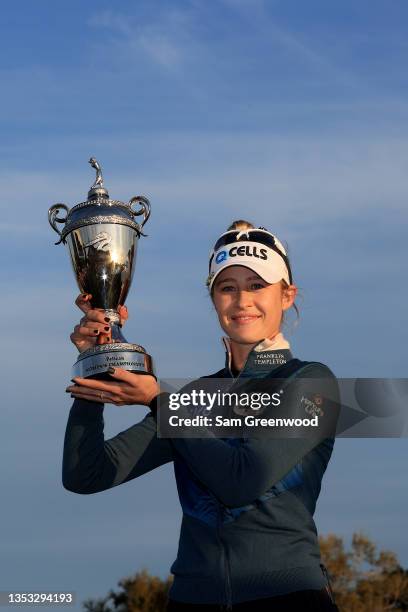 Nelly Korda poses with the trophy after winning the Pelican Women's Championship in a playoff at Pelican Golf Club on November 14, 2021 in Belleair,...