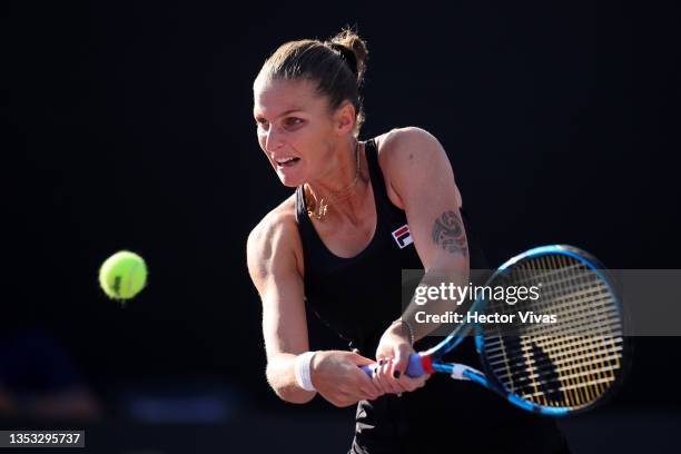 Karolina Pliskova of Czech Republic plays a backhand in her singles match against Barbora Krejcikova of Czech Republic during 2021 Akron WTA Finals...