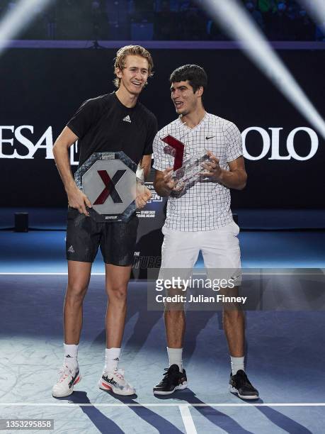 Carlos Alcaraz of Spain and Sebastian Korda of USA with their trophies after the final during Day Five of the Next Gen ATP Finals at Palalido Stadium...