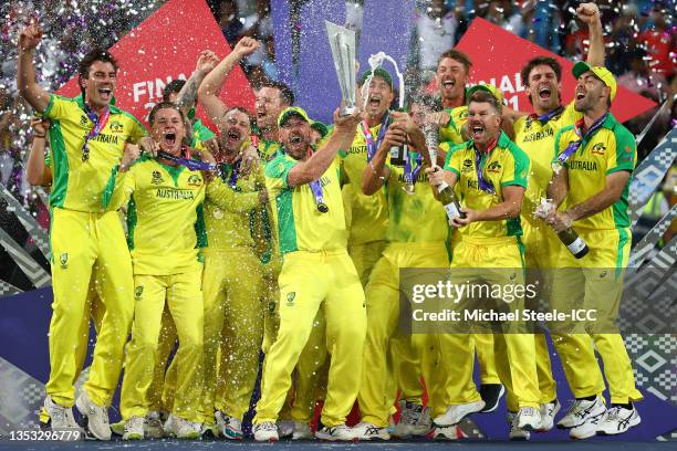 Aaron Finch of Australia lifts the ICC Men's T20 World Cup Trophy following the ICC Men's T20 World Cup final match between New Zealand and Australia...