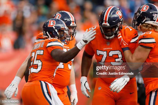 Melvin Gordon of the Denver Broncos celebrates a touchdown during the second quarter against the Philadelphia Eagles at Empower Field At Mile High on...